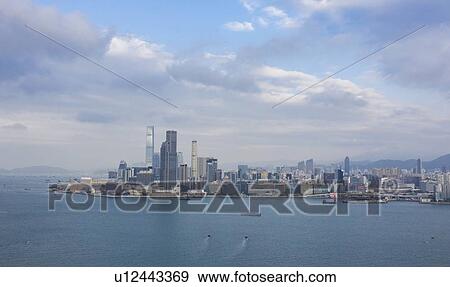 Stock Photo - Skyline by sea in Hong Kong, China. Fotosearch