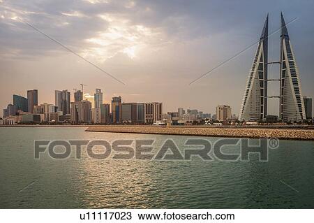Stock Image - Skyline with Bahrain World Trade Center in Manama, Bahrain. Fotosearch