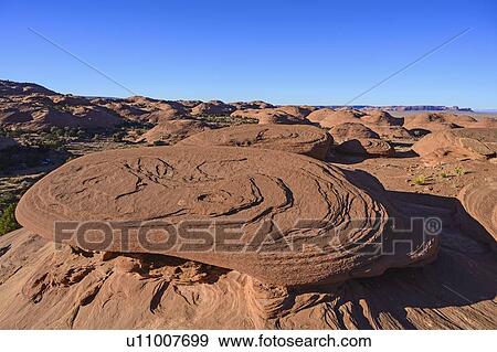 Smooth rock formations in Monument Valley, Arizona, USA View Large Photo Image Stock Photo - Smooth rock formations in Monument Valley, Arizona, USA. Fotosearch
