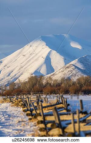 Stock Photo - Snow capped mountains in Picabo, Idaho. Fotosearch