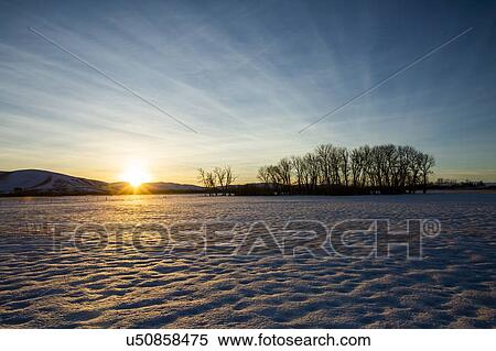 Snow field at sunset in Picabo, Idaho View Large Photo Image Stock Photography - Snow field at sunset in Picabo, Idaho. Fotosearch