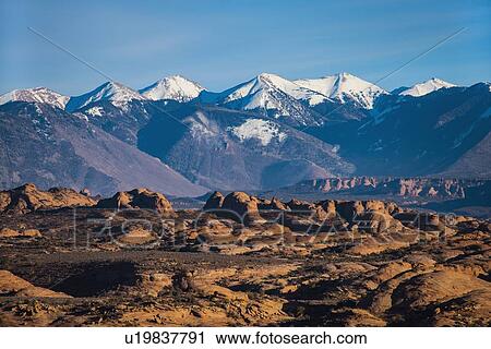 Snowcapped La Sal Mountains and sand dunes in Arches National Park, Utah, USA View Large Photo Image Stock Image - Snowcapped La Sal Mountains and sand dunes in Arches National Park, Utah, USA. Fotosearch