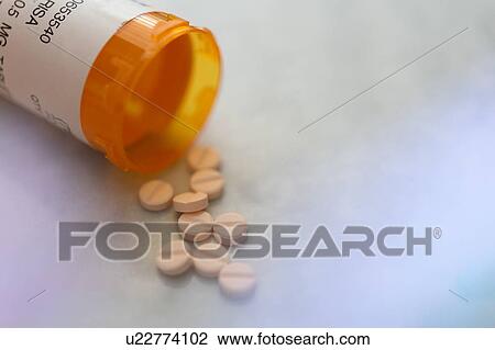 Stock Image - Spilled pill bottle. Fotosearch