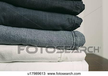 Stock Image - Stack of folded clothes. Fotosearch