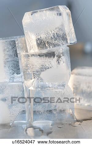 Stock Photo - Stacked ice cubes. Fotosearch
