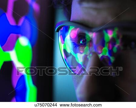 Student understanding the design of a molecular structure on computer screen in laboratory, close up View Large Photo Image Picture - Student understanding the design of a molecular structure on computer screen in laboratory, close up. Fotosearch