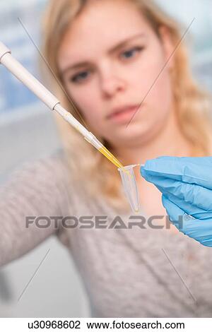 Student using pipette. View Large Photo Image Stock Image - Student using pipette.. Fotosearch