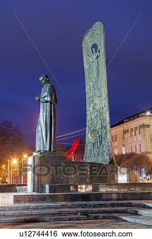 Stock Photograph - Taras Shevchenko monument at night in Lviv, Ukraine. Fotosearch