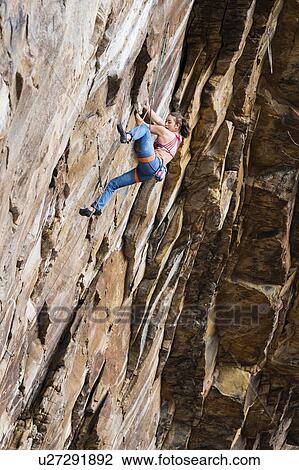 Teenage girl rock climbing View Large Photo Image Stock Image - Teenage girl rock climbing. Fotosearch