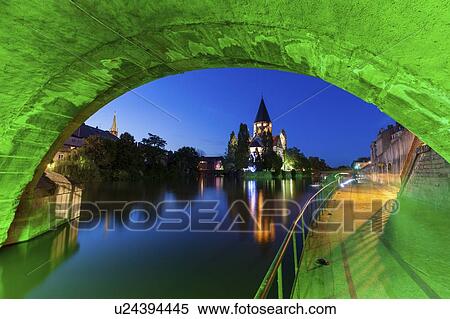 Stock Photography - Temple Neuf and illuminated bridge in Metz, France. Fotosearch