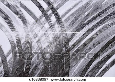 Tire tracks in snow View Large Photo Image Stock Photo - Tire tracks in snow. Fotosearch