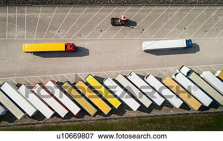 Trailers parked before being loaded onto ferry to UK, overhead view, Hook of Holland, Zuid-Holland, Netherlands View Large Photo Image Stock Photo - Trailers parked before being loaded onto ferry to UK, overhead view, Hook of Holland, Zuid-Holland, Netherlands. Fotosearch