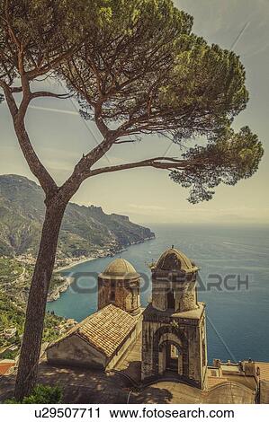 Tree over bell towers of Villa Rufolo in Ravello, Amalfi Coast, Italy View Large Photo Image Stock Image - Tree over bell towers of Villa Rufolo in Ravello, Amalfi Coast, Italy. Fotosearch