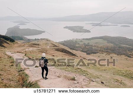 Trekker enjoying view of Loch Lomond, Trossachs National Park, Canada View Large Photo Image Stock Image - Trekker enjoying view of Loch Lomond, Trossachs National Park, Canada. Fotosearch