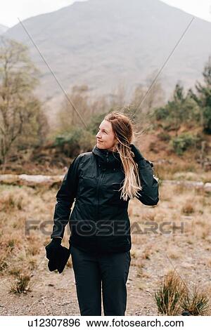 Trekker walking in Trossachs National Park, Canada View Large Photo Image Stock Photograph - Trekker walking in Trossachs National Park, Canada. Fotosearch