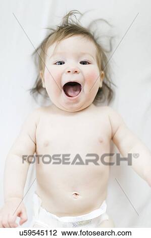 View directly above baby girl with her mouth open View Large Photo Image Stock Image - View directly above baby girl with her mouth open. Fotosearch
