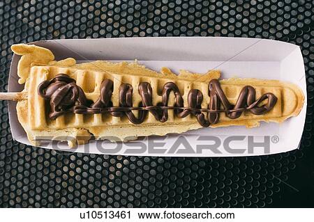 Waffle on stick with chocolate View Large Photo Image Stock Image - Waffle on stick with chocolate. Fotosearch