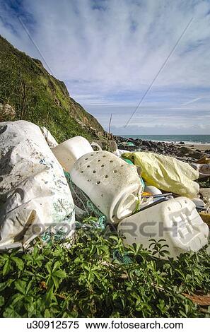 Stock Photography - Washed-up plastic litter on the North Wales coast, UK.. Fotosearch