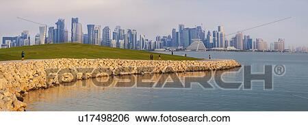 Waterfront by skyline of Doha, Qatar View Large Photo Image Stock Photograph - Waterfront by skyline of Doha, Qatar. Fotosearch