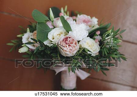 Wedding bouquet tied with pink ribbon View Large Photo Image Stock Photography - Wedding bouquet tied with pink ribbon. Fotosearch