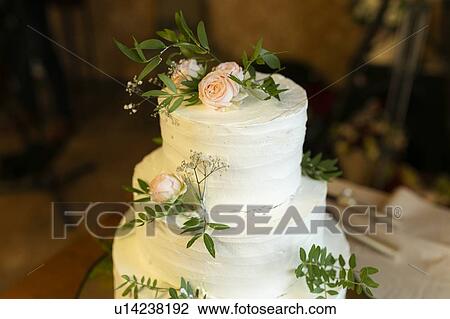 Stock Image - Wedding cake with roses. Fotosearch