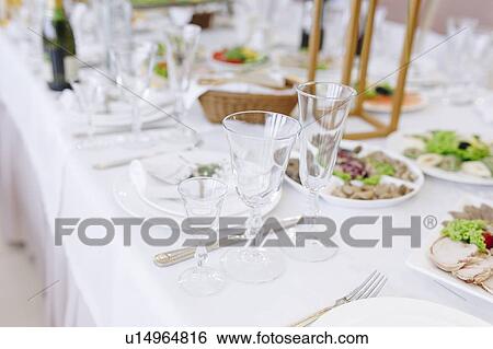 Wedding place setting with drinking glasses View Large Photo Image Stock Photograph - Wedding place setting with drinking glasses. Fotosearch