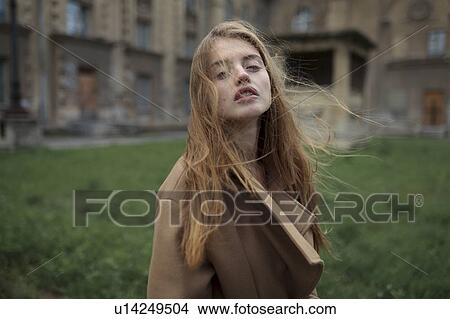 Picture - Windswept young woman. Fotosearch