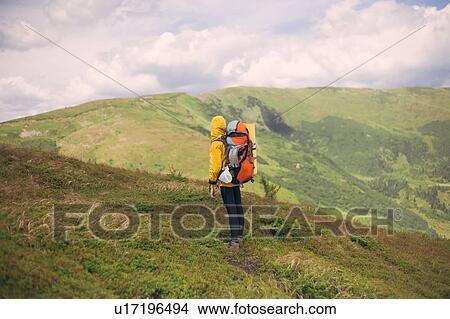 Picture - Woman hiking in the Carpathian Mountain Range. Fotosearch