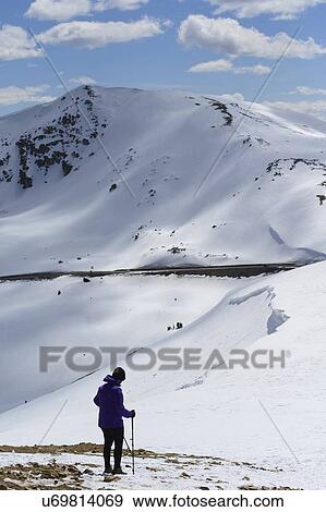 Stock Photo - Woman hiking on Loveland Pass in Colorado, USA. Fotosearch