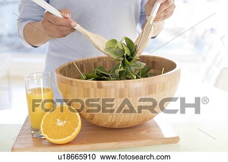 Woman making fresh salad. View Large Photo Image Stock Image - Woman making fresh salad.. Fotosearch
