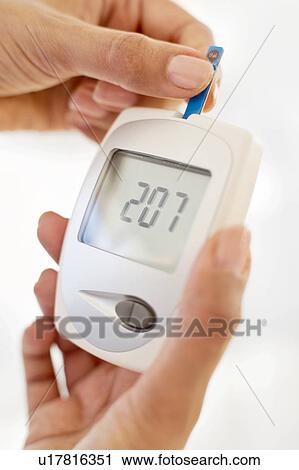 Woman testing cholesterol. View Large Photo Image Stock Image - Woman testing cholesterol.. Fotosearch