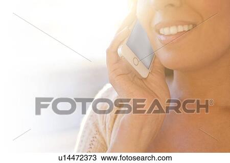 Woman using smartphone. View Large Photo Image Stock Image - Woman using smartphone.. Fotosearch
