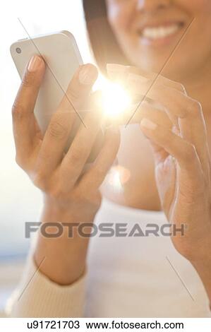 Woman using smartphone. View Large Photo Image Stock Image - Woman using smartphone.. Fotosearch