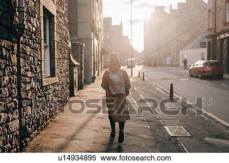 Woman walking on street, Edinburgh, Scotland View Large Photo Image Stock Photography - Woman walking on street, Edinburgh, Scotland. Fotosearch