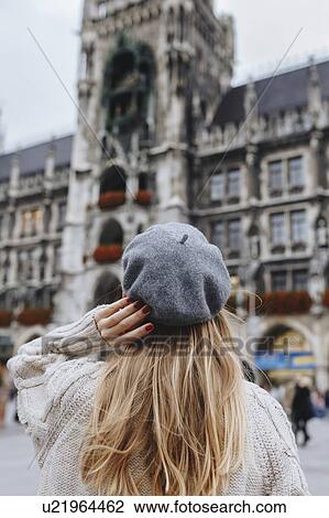 Woman wearing beret by New Town Hall in Munich, Germany View Large Photo Image Stock Image - Woman wearing beret by New Town Hall in Munich, Germany. Fotosearch