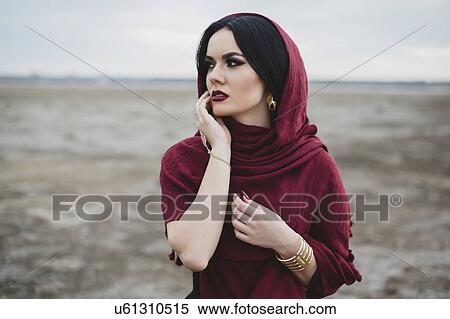 Woman wearing red headscarf and lipstick View Large Photo Image Stock Photography - Woman wearing red headscarf and lipstick. Fotosearch