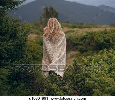 Woman wrapped in blanket in the Carpathian Mountain Range View Large Photo Image Stock Image - Woman wrapped in blanket in the Carpathian Mountain Range. Fotosearch