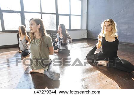 Women during yoga class View Large Photo Image Picture - Women during yoga class. Fotosearch