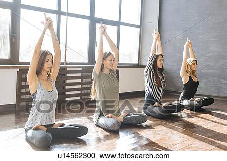 Women during yoga class View Large Photo Image Stock Image - Women during yoga class. Fotosearch