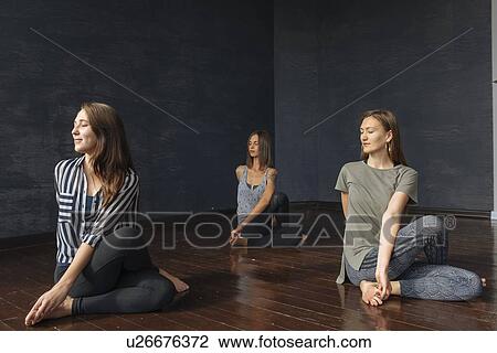 Women during yoga class View Large Photo Image Stock Image - Women during yoga class. Fotosearch