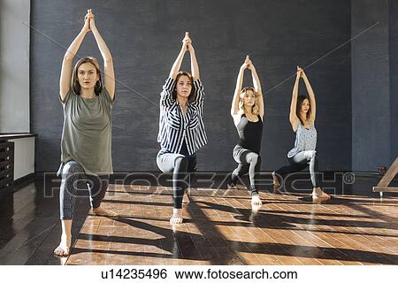 Women during yoga class View Large Photo Image Stock Photograph - Women during yoga class. Fotosearch