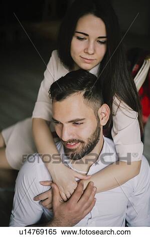 Young couple embracing View Large Photo Image Stock Photography - Young couple embracing. Fotosearch