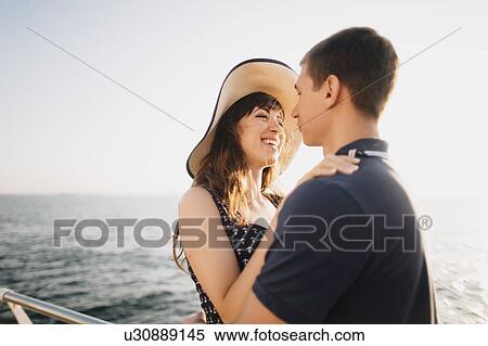 Young couple on pier View Large Photo Image Stock Photography - Young couple on pier. Fotosearch