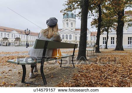 Stock Photo - Young woman by Charlottenburg Palace. Fotosearch