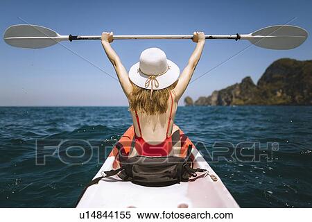 Young woman in kayak on sea in Krabi, Thailand View Large Photo Image Stock Photography - Young woman in kayak on sea in Krabi, Thailand. Fotosearch