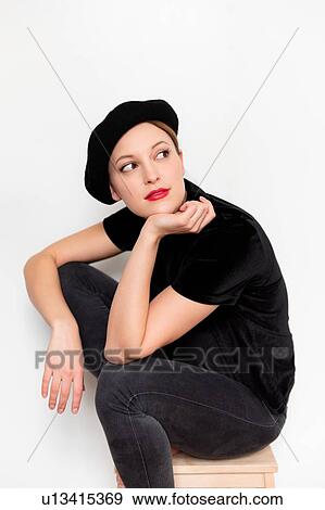 Young woman wearing beret and red lipstick View Large Photo Image Stock Photo - Young woman wearing beret and red lipstick. Fotosearch