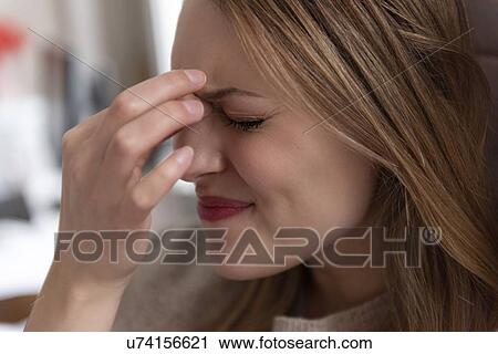 Young woman with headache View Large Photo Image Stock Image - Young woman with headache. Fotosearch