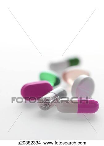Assortment of pills, tablets and capsules. View Large Photo Image Picture - Assortment of pills, tablets and capsules.. Fotosearch
