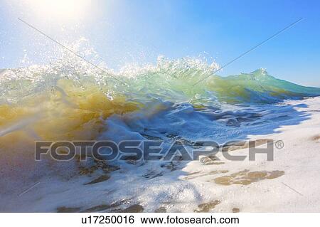 Stock Photograph - Breaking wave.. Fotosearch