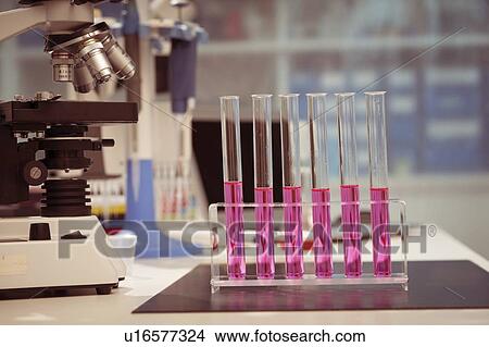 Picture - Chemistry research, conceptual image.. Fotosearch